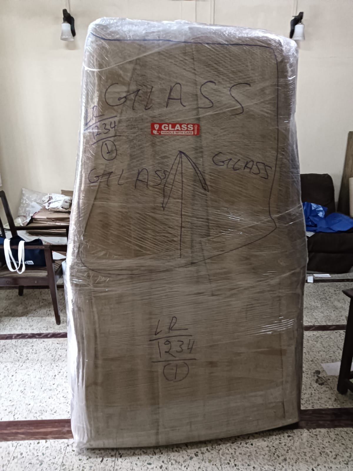Fragile glass item packed and marked handle with care in J B Nagar