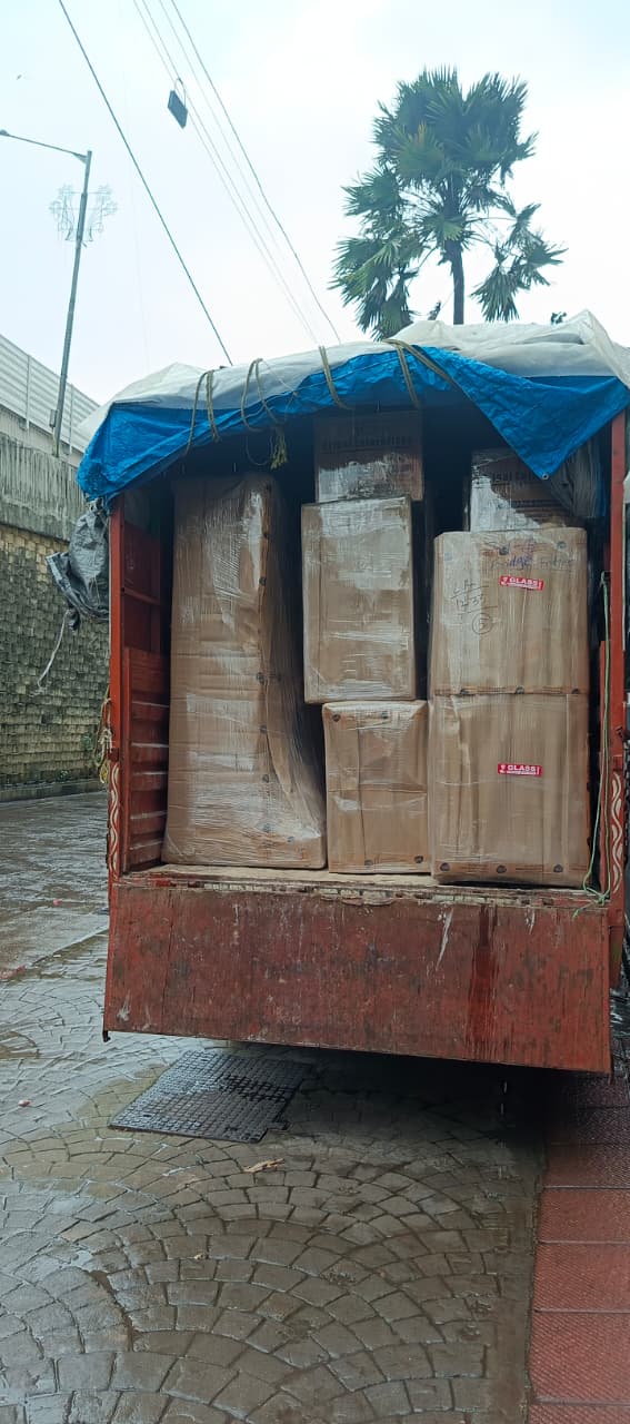 Truck fully loaded with packed household goods in J B Nagar Andheri East