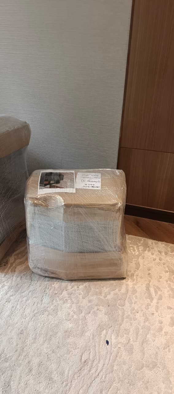 Household furniture wrapped in stretch film for house shifting in J B Nagar